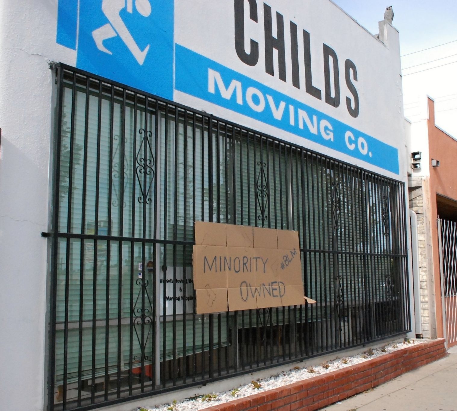 Childs1 minority owned business sign storefront brenda rees.jpg